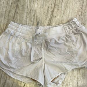 White Lululemon 2 inch shorts, shadows in pictures of shorts, not stained